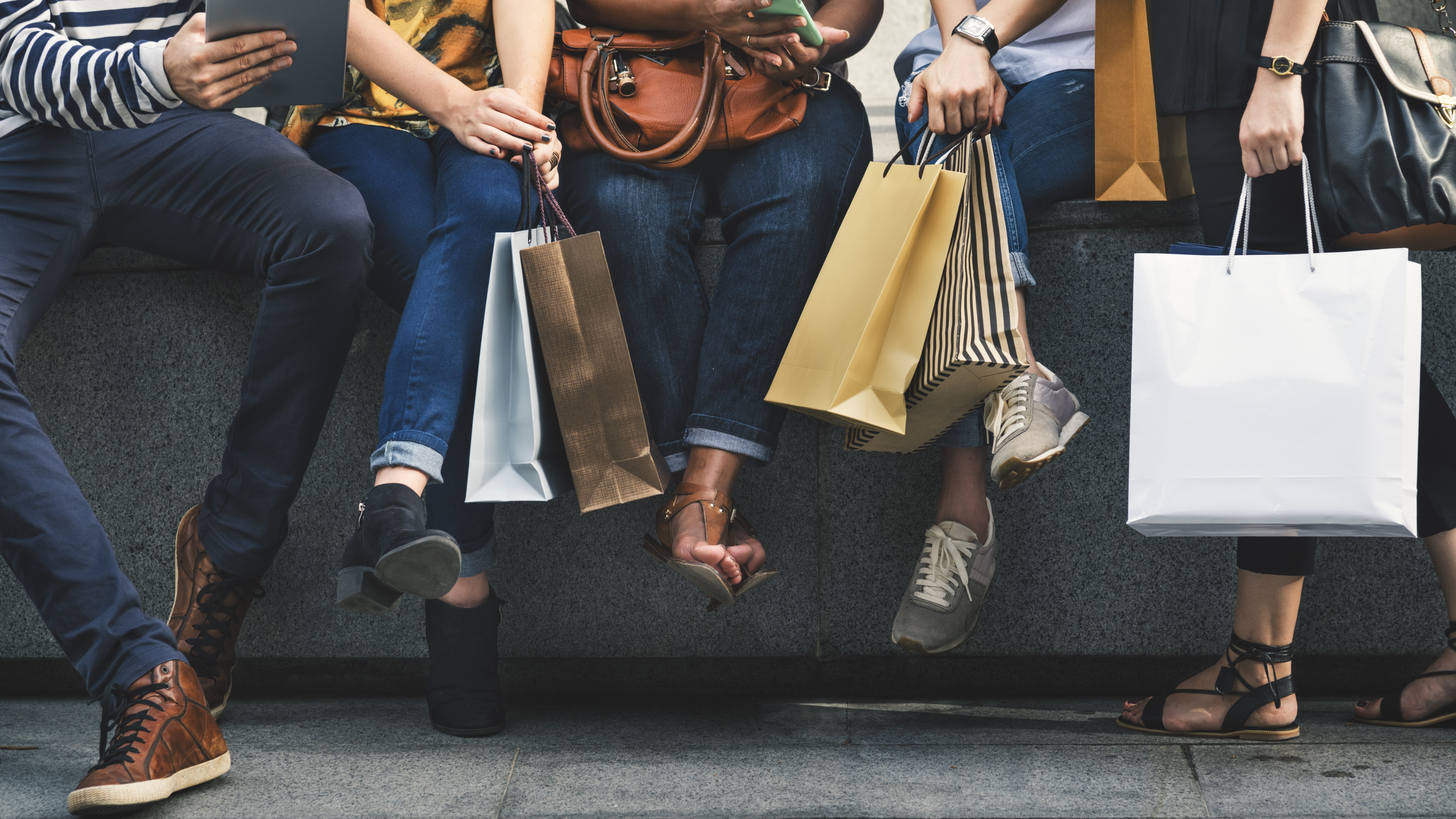 Friends with shopping bags