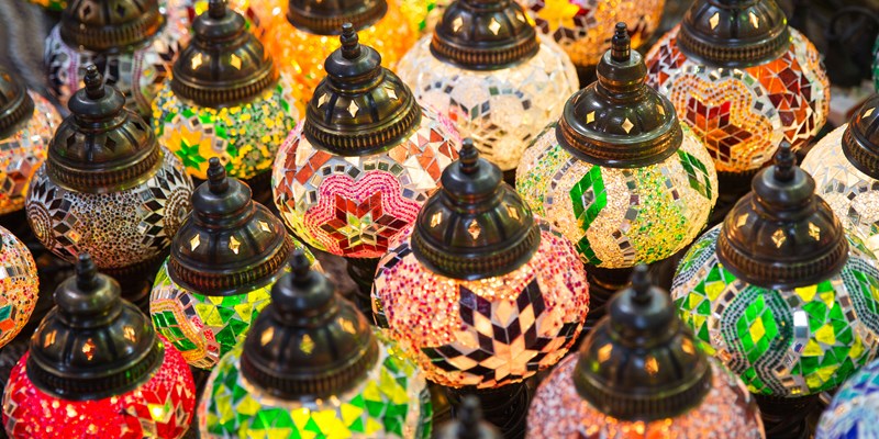 Traditional multicolored eastern glass lamps lighting on Asian market